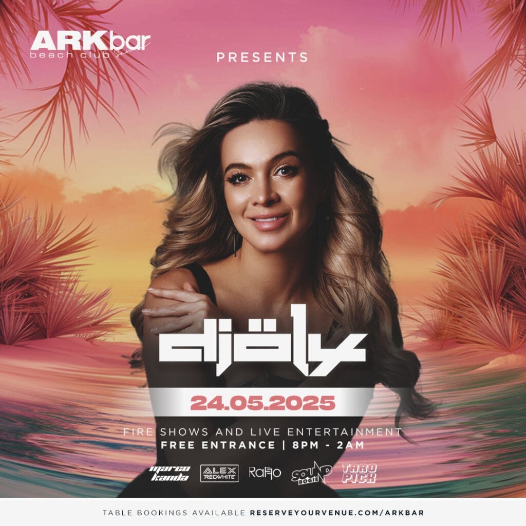 DJoly performing live at ARKbar Beach Club on May 24, 2025, in Koh Samui, Thailand, with a vibrant crowd and fire shows